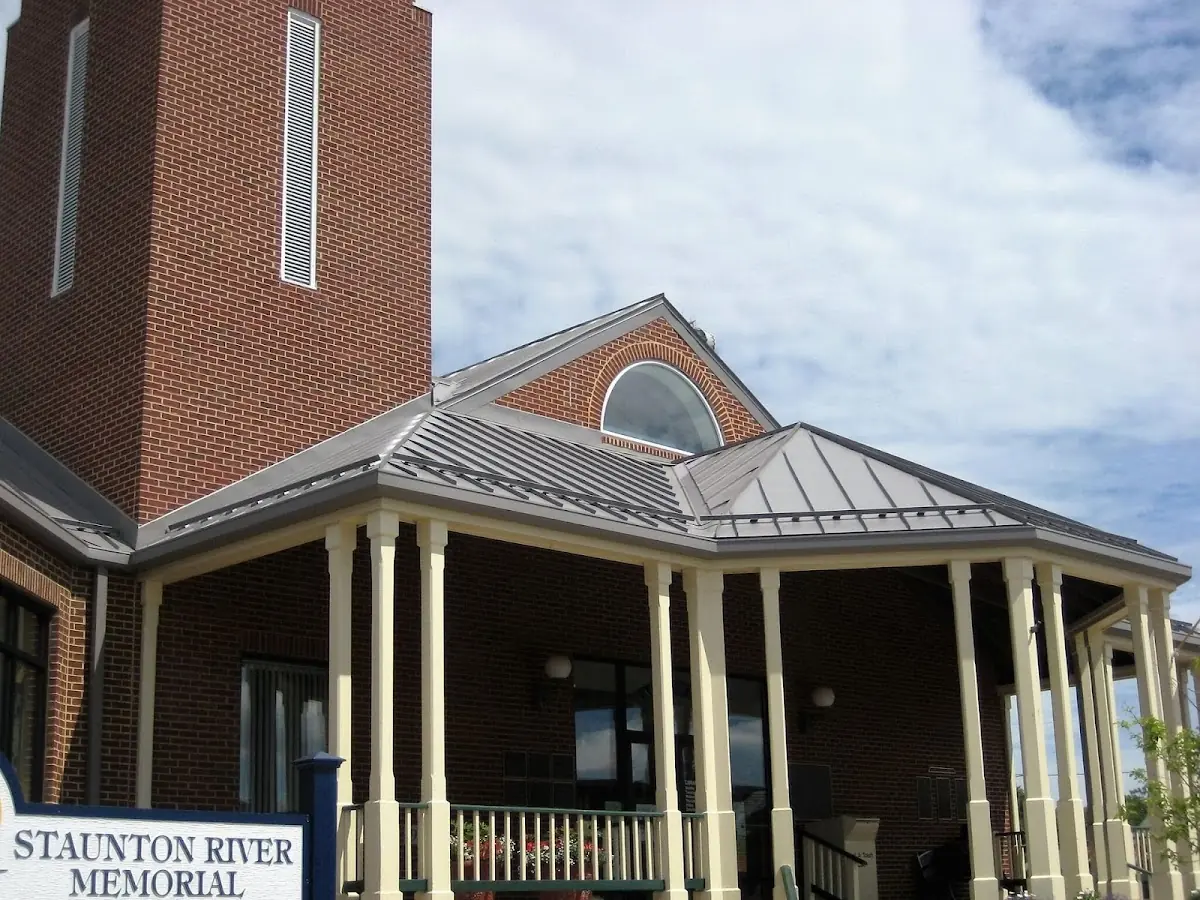 Skilled roofing craftsmen working on a residential roof in Four Corners